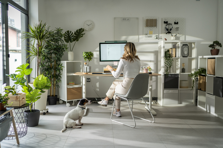 Person working from a home office with a computer and dedicated workspace, representing working from home and remote work tax deduction claims. Person working from a home office with a computer and dedicated workspace, representing working from home and remote work tax deduction claims.