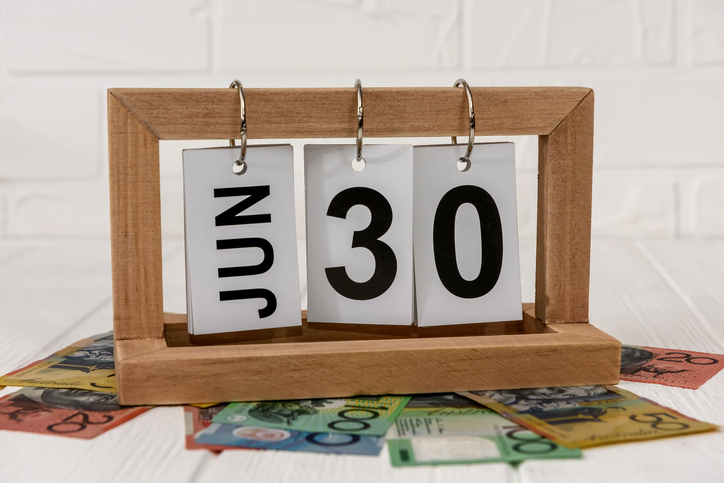 Wooden flip calendar displaying 30 June on Australian dollar notes, representing the EOFY tax checklist and end of financial year tax planning before the Australian tax return deadline. Wooden flip calendar displaying 30 June on Australian dollar notes, representing the EOFY tax checklist and end of financial year tax planning before the Australian tax return deadline.